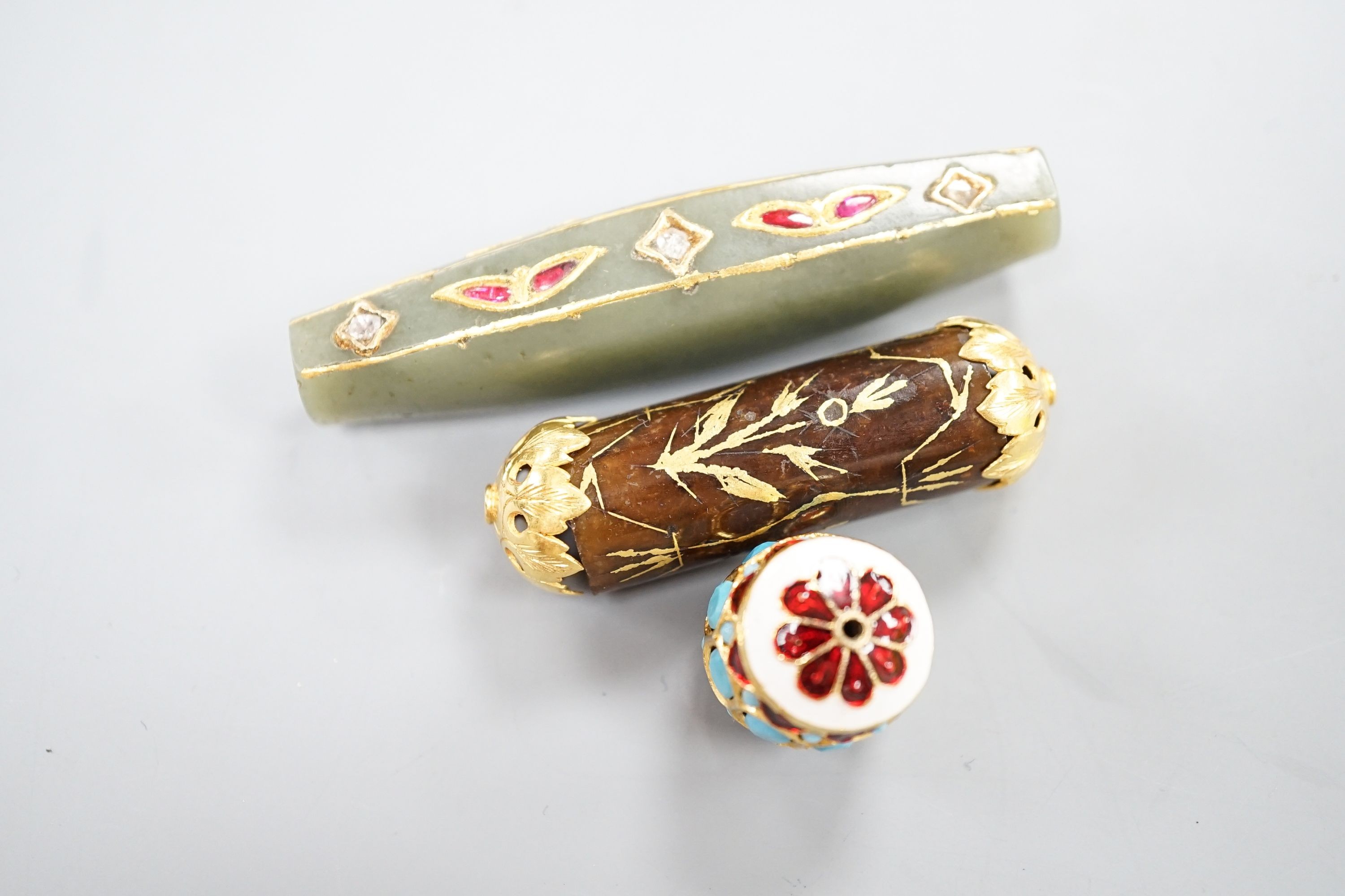 Three assorted Indian curios including gem and diamond set and enamelled, largest 7cm